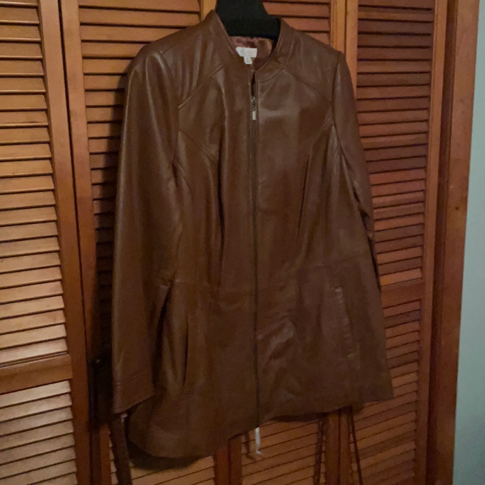 Brownish tan d&co leather jacket.